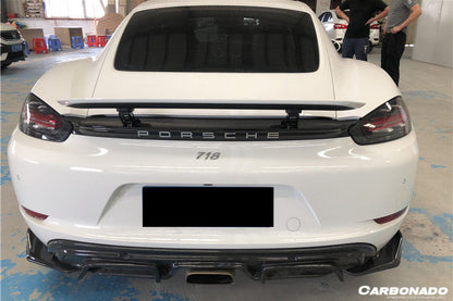 2017-2023 Porsche 718 Cayman/Boxster AM Style Carbon Fiber Rear Lip w/ Caps - Carbonado
