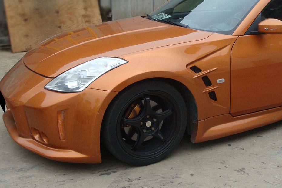2003-2008 Nissan 350Z JP Style Fender - Carbonado